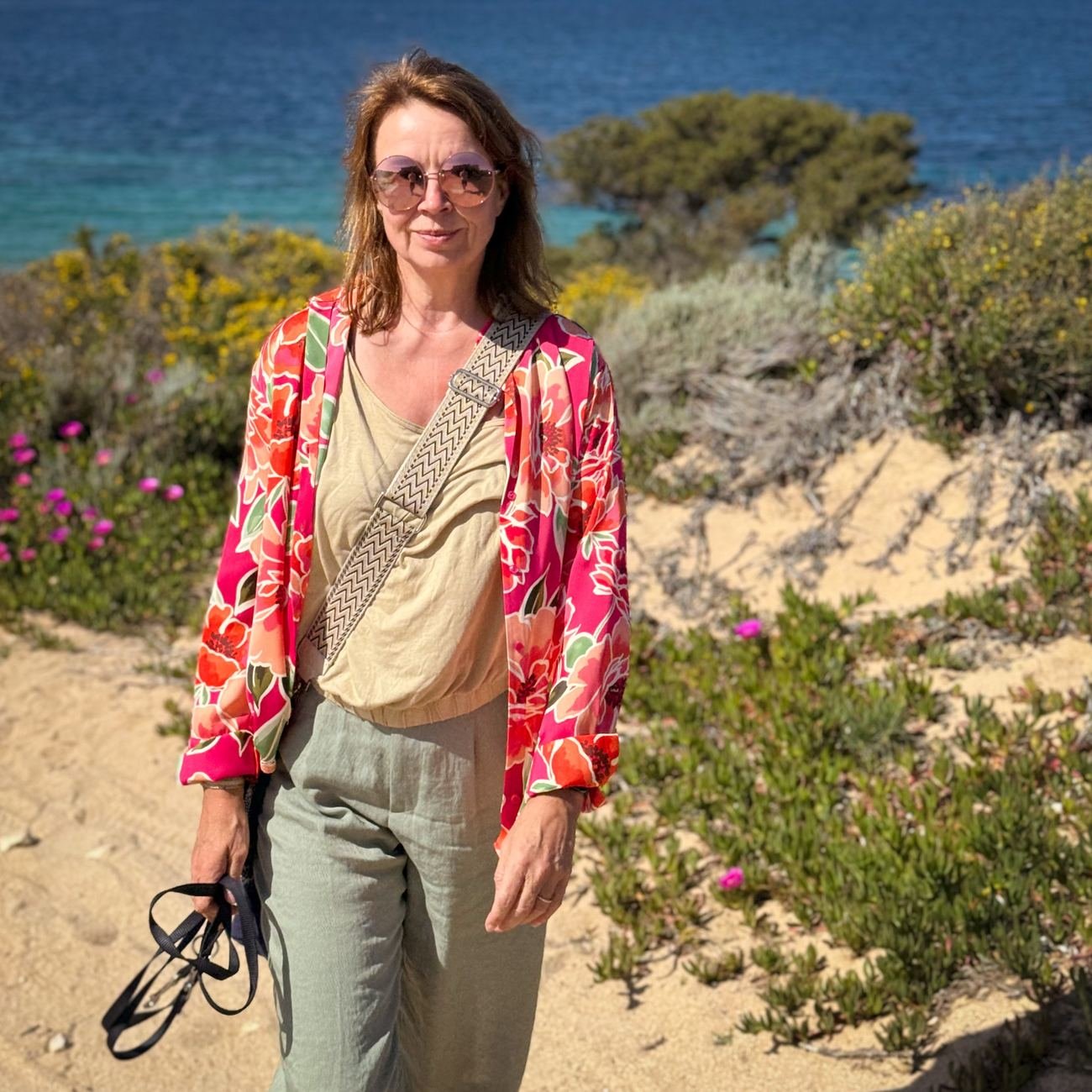 Elke Bayer on the dunes above the sea in the north of Sardinia