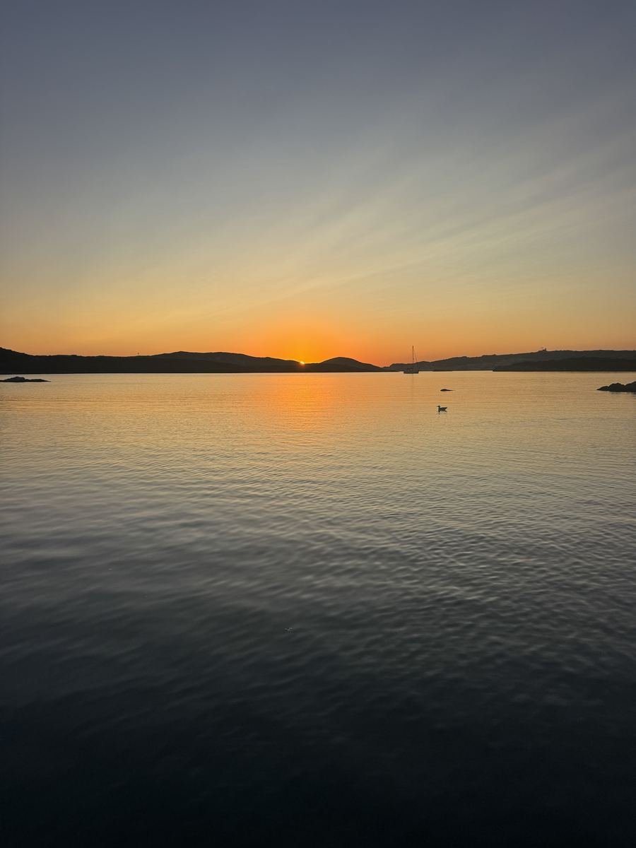Sunset over a calm bay