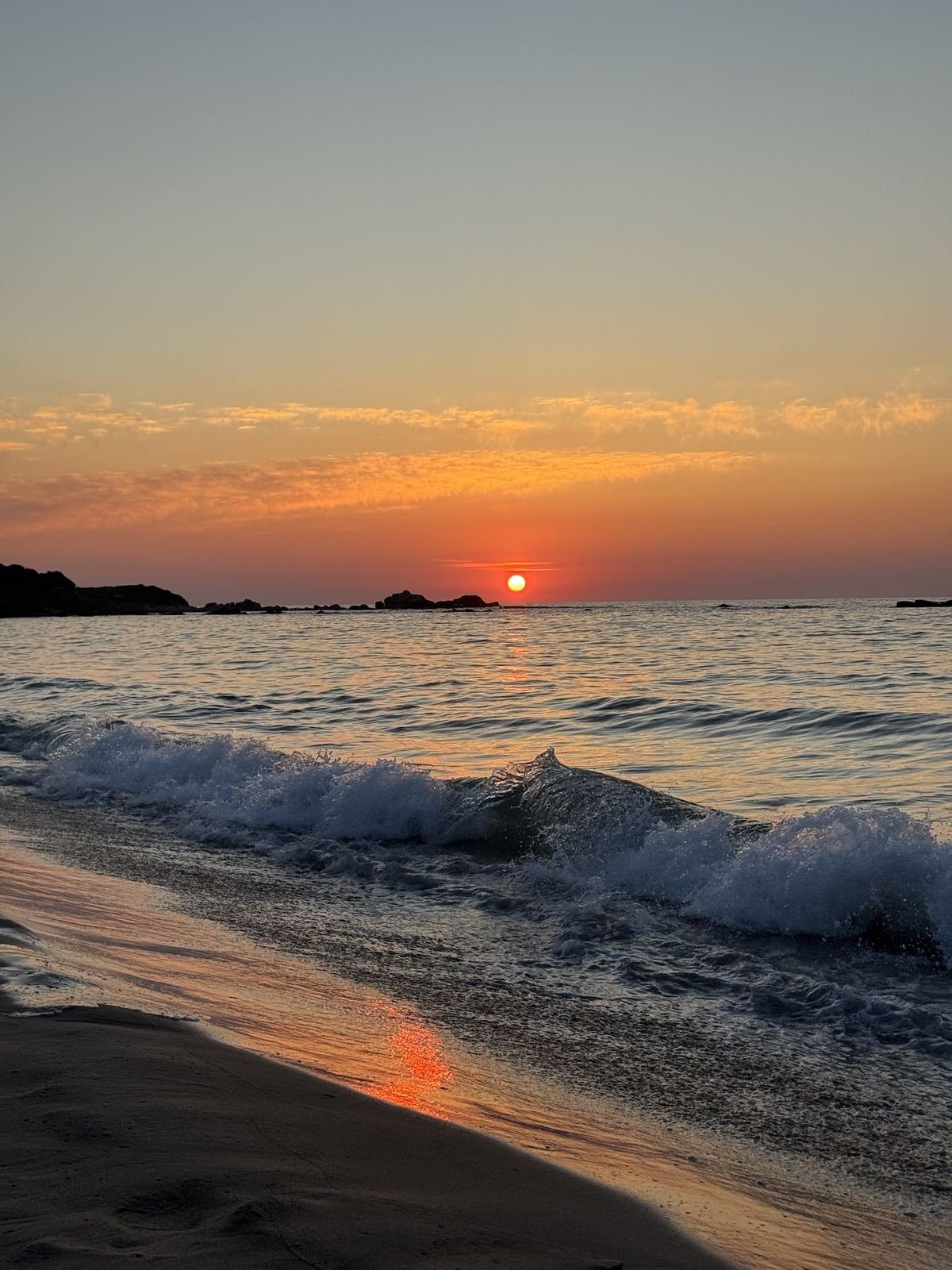 Sunset over a beach in the north of Sardinia